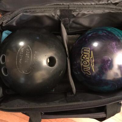 Bowling balls and rolling bag