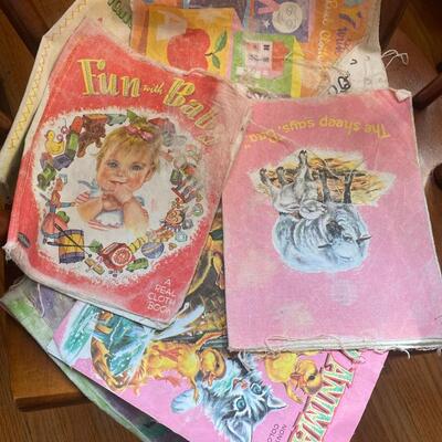 1B14 Puzzles, toys, cloth books, small childâ€™s rocking chair, miscellaneous