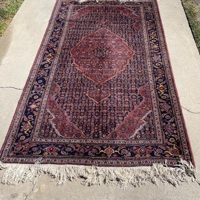 LOT 56   HAND KNOTTED PERSIAN RUG DARK COLORS