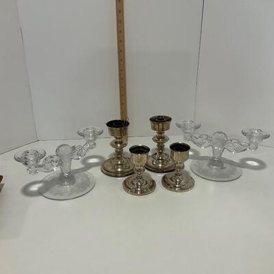 2 crystal candle holders and 4 silver plated candle holders