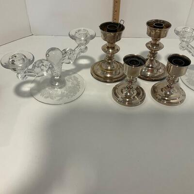2 crystal candle holders and 4 silver plated candle holders