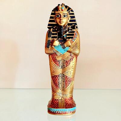 LOT 69  KING TUT EGYPTIAN MODEL SARCOPHAGUS WITH PHARAOH INSIDE.