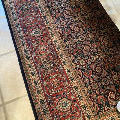 Oriental Rug with blue and red tones