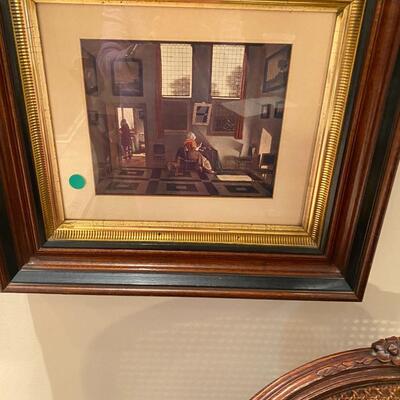 Small picture-woman at a table