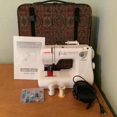 Lot E - 1072. Janome Jem Gold Sewing Machine Model 660