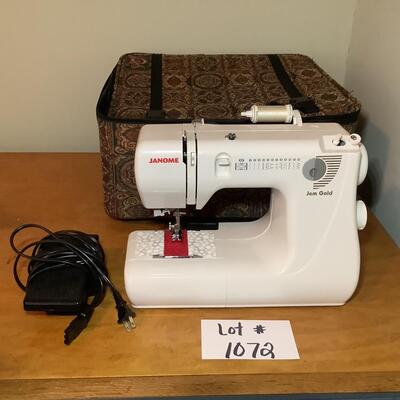 Lot E - 1072. Janome Jem Gold Sewing Machine Model 660