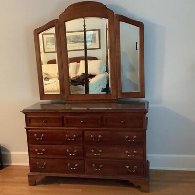 Lot  F - 1134  Sumter Cabinet Co. Glass-top Cherry Dresser with Trifold Beveled Mirror