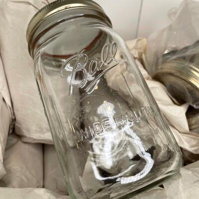 Wicker Basket of Mason Jars and Lids
