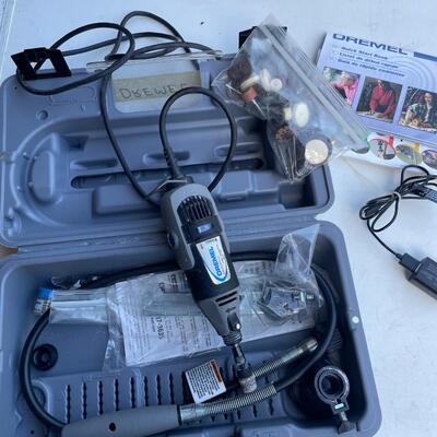 Lot 21. Dremel with Accessories