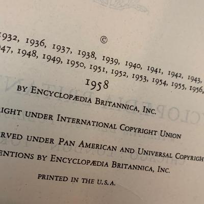 1958 Encyclopedia Brittanica Set with original shelf unit.