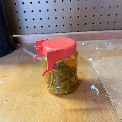 Lot 60. Pegboard Storage Jars of Hardware