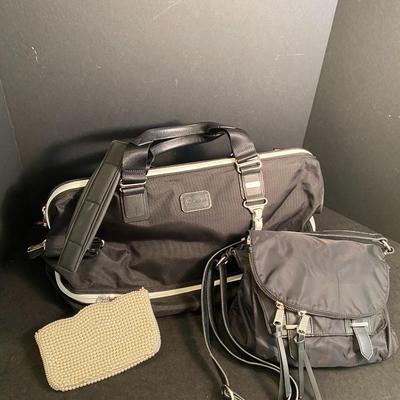 Lot 231.  Tumi Travel Tote and Two Purses