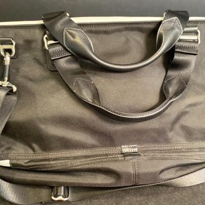 Lot 231.  Tumi Travel Tote and Two Purses