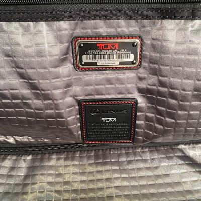 Lot 231.  Tumi Travel Tote and Two Purses