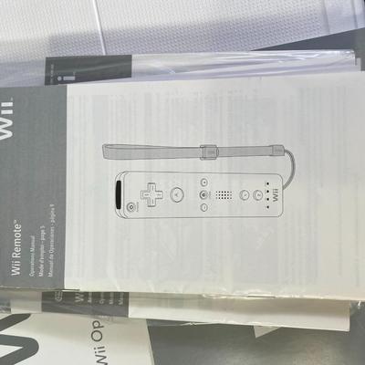 Lot 244.  Wii Accessories and Games
