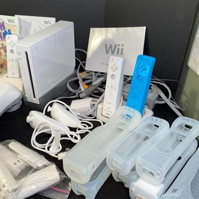 Lot 244.  Wii Accessories and Games