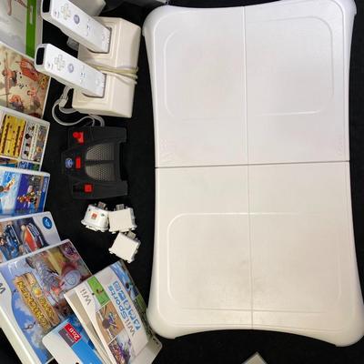 Lot 244.  Wii Accessories and Games
