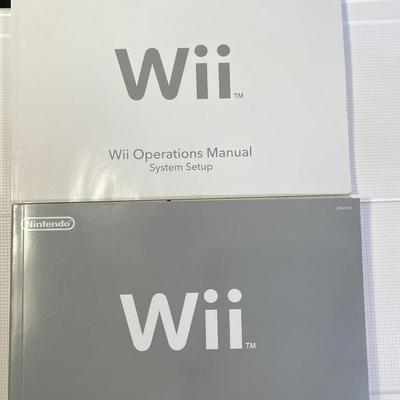 Lot 244.  Wii Accessories and Games