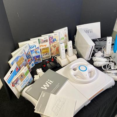 Lot 244.  Wii Accessories and Games