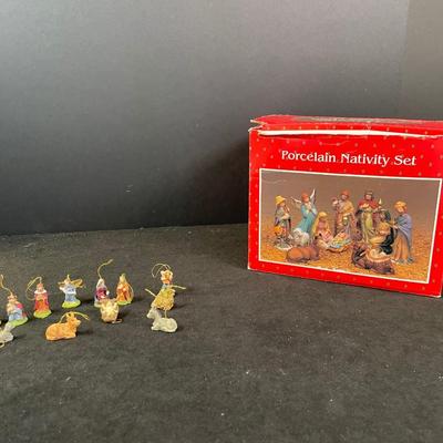 Lot 297. Nativity Figurine Set and Tiny Nativity Ornaments