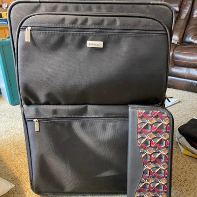 Lot 320. Large Suitcase
