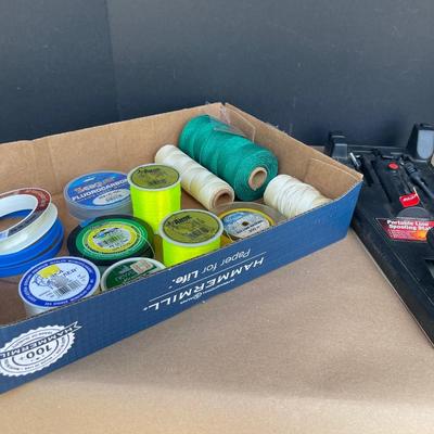 Lot 65. Line spooling Station and Assorted Fishing Line