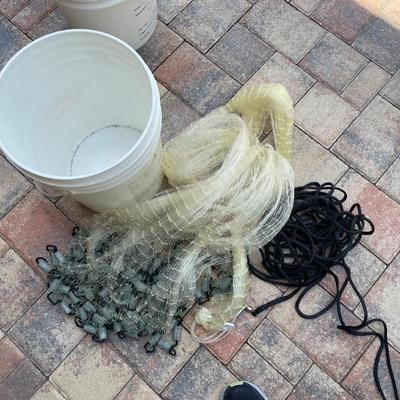 Lot 79. Weighted Fishing Net with Storage Bucket