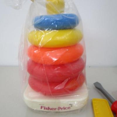 #2 Toddler play tools and Fisher Price stacking toy