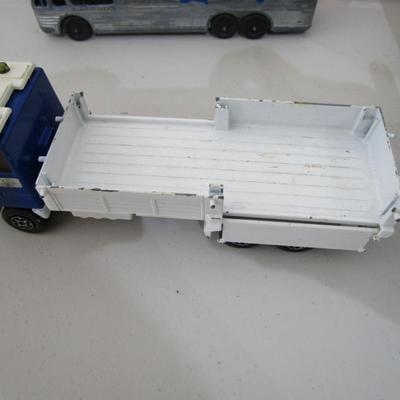 #17 medium size trucks, trailers, Jeeps, boat
