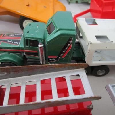 #17 medium size trucks, trailers, Jeeps, boat