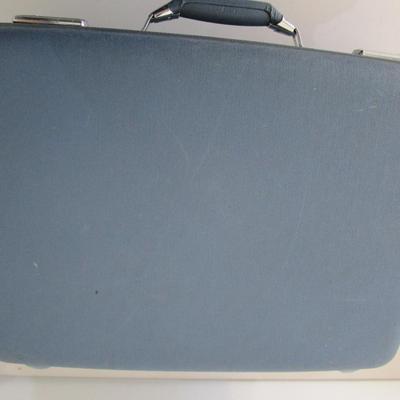 #44 American Tourister blue suitcase