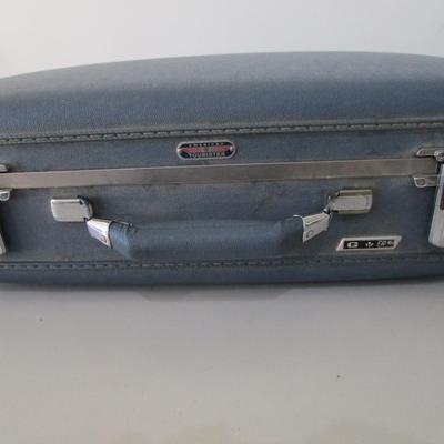 #44 American Tourister blue suitcase