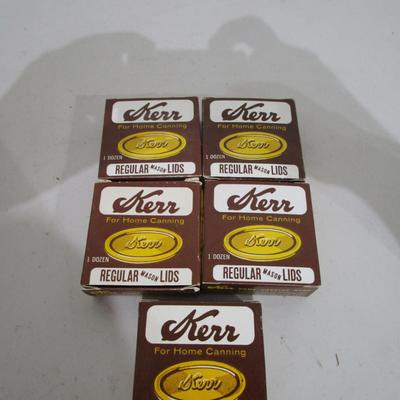 #64 5 boxes of Kerr regular mouth lids (12 lids to a box)