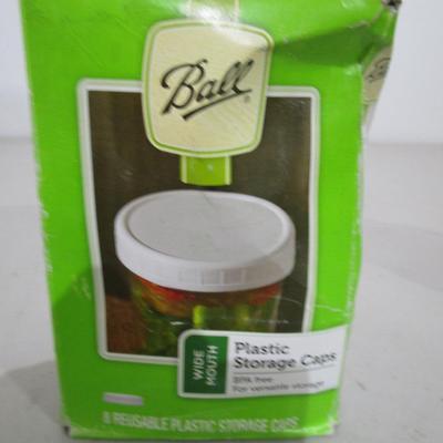 #67 1 box of eight plastic wide mouth storage lids