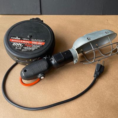 Lot 114  work Light with Retractable Cord Reel