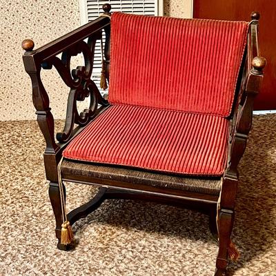 LOT 103  FANCY SPANISH REVIVAL CHAIR RED CUSHIONS TASSELS