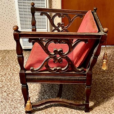 LOT 103  FANCY SPANISH REVIVAL CHAIR RED CUSHIONS TASSELS
