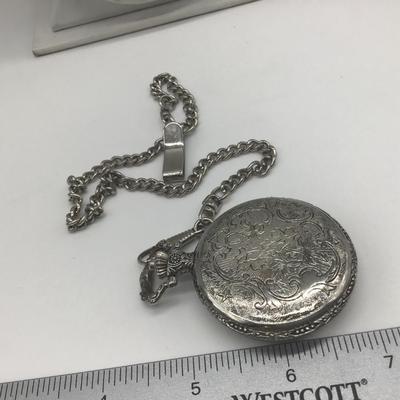 Pocket watch and Chain. Tested working Perfectly
