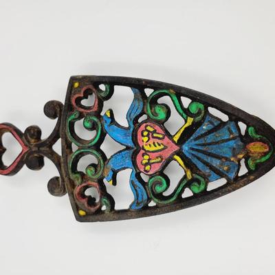 VINTAGE HAND PAINTED CAST IRON TRIVET