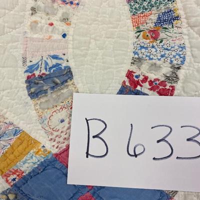 Hand-quilted wedding ring quilt