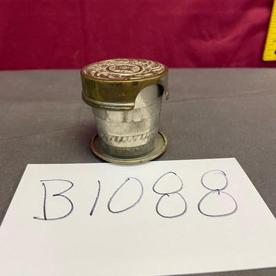 Antique silver color metal collapsible trivet drink cup