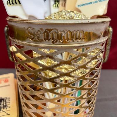 Swivel sticks/seagrams container