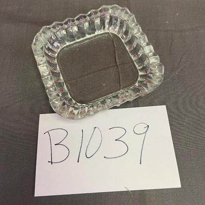 Square glass trinket dish with saw tooth edge