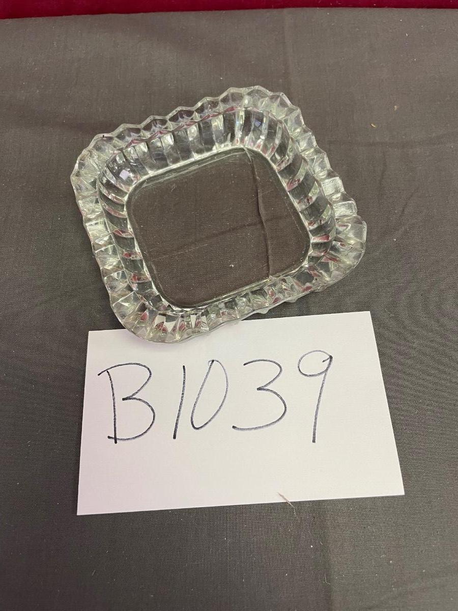 Square glass trinket dish with saw tooth edge