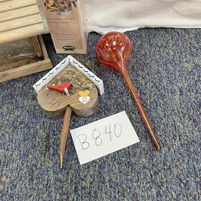 Bird house and watering bulb