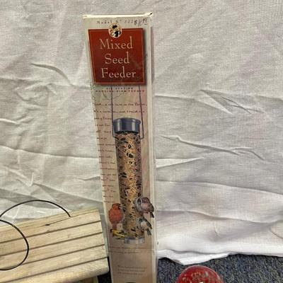 Bird house and watering bulb