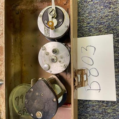 Rustic tackle box w/reel assortment