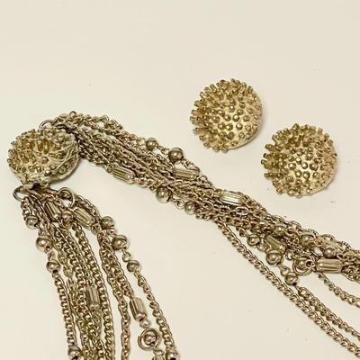 LOT 134   VINTAGE MULTI STRAND GOLD TONE CHAIN NECKLACE W/MATCHING CLIP ON EAR RINGS