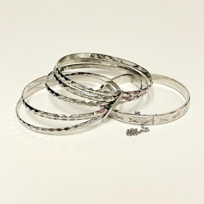 LOT 135   SILVER TONE BANGLES