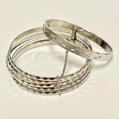 LOT 135   SILVER TONE BANGLES